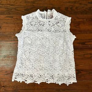 Nanette Lepore beautiful lace, sleeveless top. Zip up back. Size L